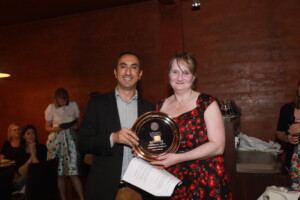 Photo of Annemarie Sluijmers receiving the Collaborate award during the ELEVATE 2023 Conference